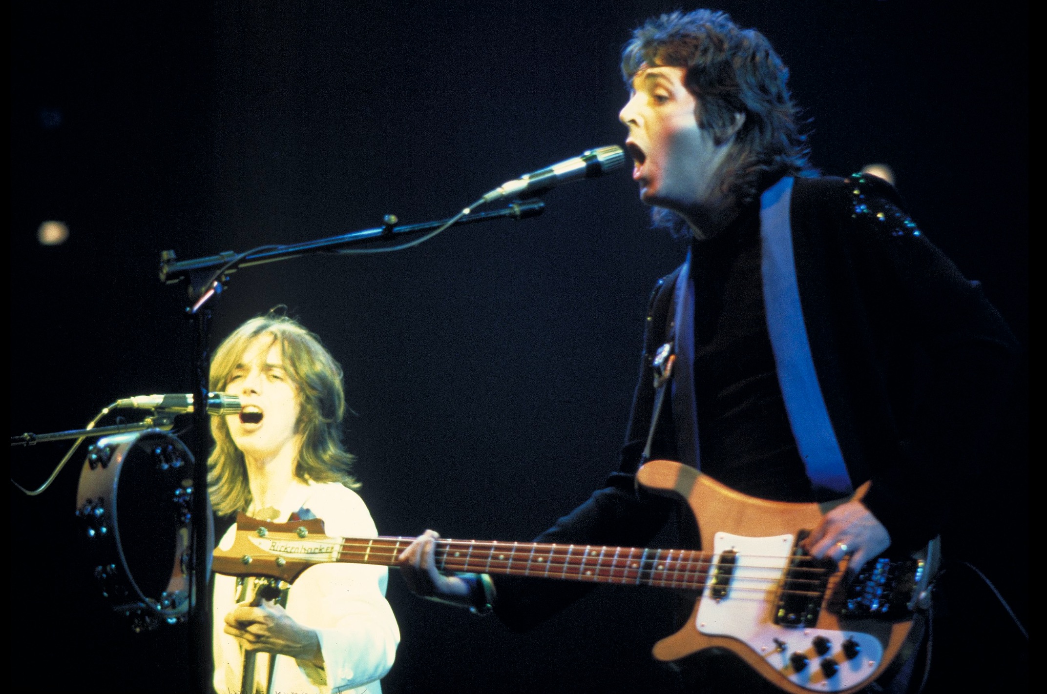 Paul McCartney and Jimmy McCulloch during a Wings concert
